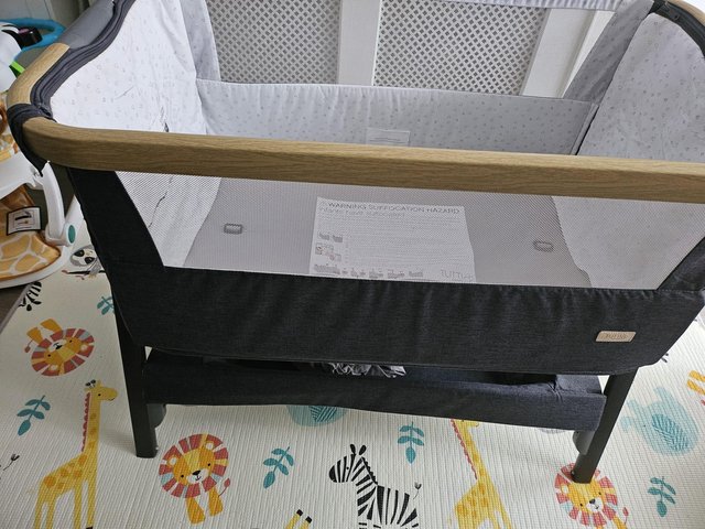 Preview of the first image of Tutti bambini Cozee lite crib with Mattress £50.