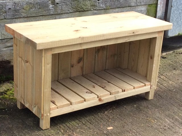 Preview of the first image of Garden Bench, with storage room, pots, log store. Heavy duty.