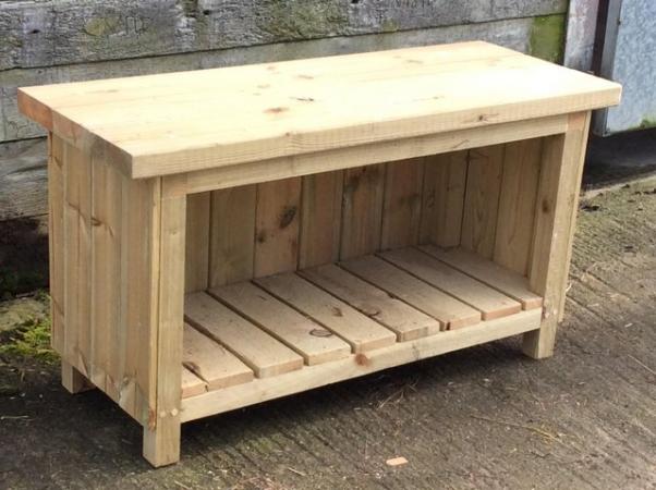 Image 1 of Garden Bench, with storage room, pots, log store. Heavy duty