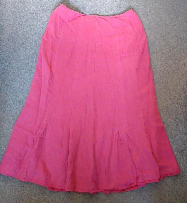 Preview of the first image of Marks and Spencer Per Una long pink linen skirt-size 14 (UK).