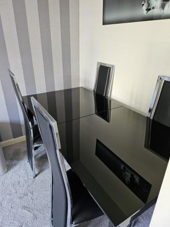 Image 1 of Black and chrome extendable dining table and 4 chairs,