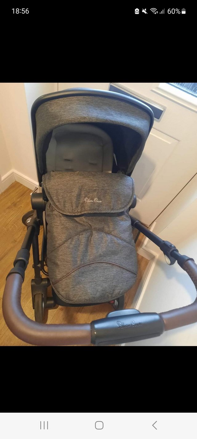 Preview of the first image of Silver cross pram with car seat and isofix.