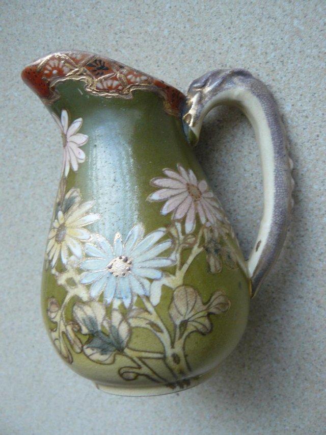 Preview of the first image of Small green decorative jug, vintage.