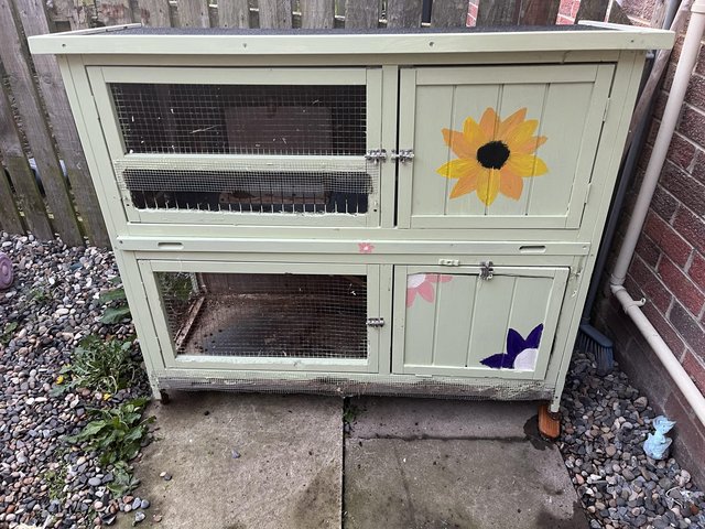Preview of the first image of Hand painted, double level, rabbit hutch.