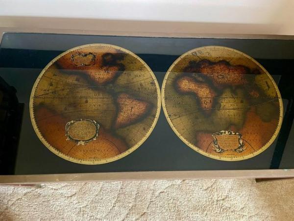 Image 3 of Coffee table with map on it