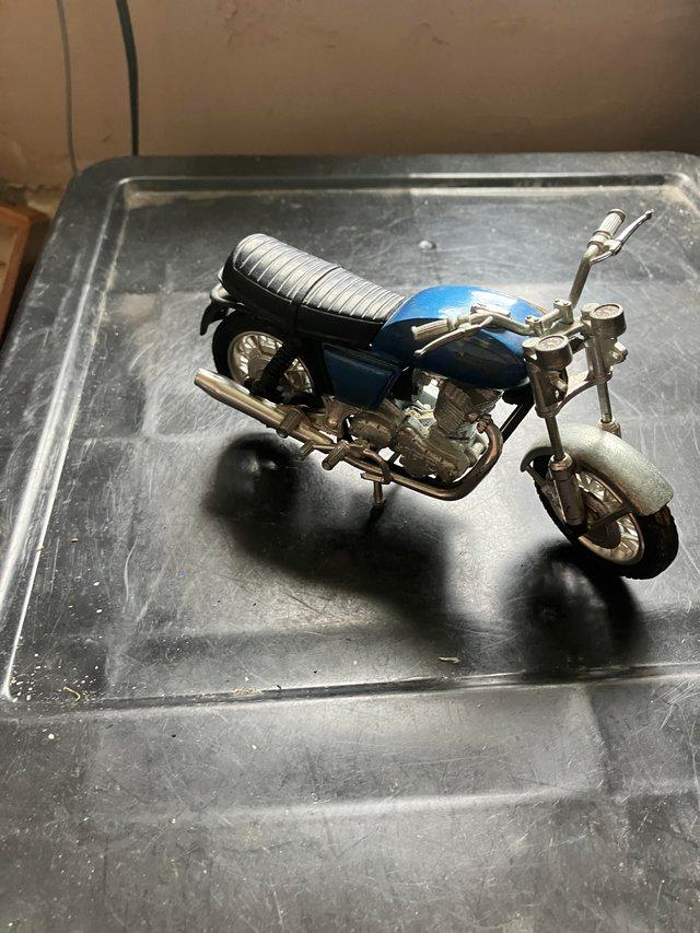 Preview of the first image of Model of Norton blue motorcycle.