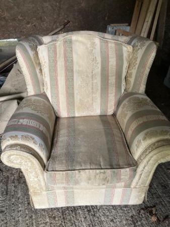 Image 1 of Wingback armchair. in need of new loose covers