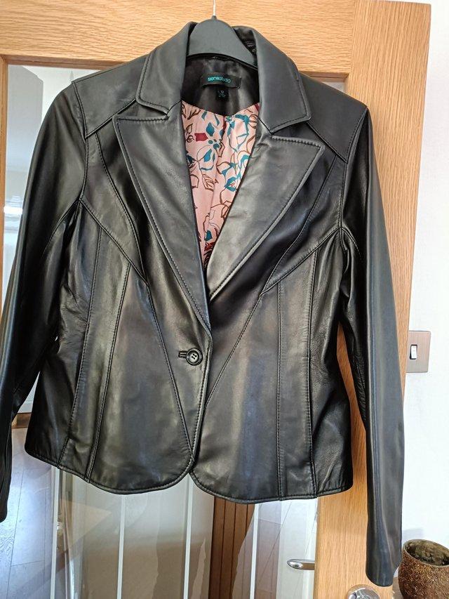 Preview of the first image of Ladies Black Leather Jacket size 12.