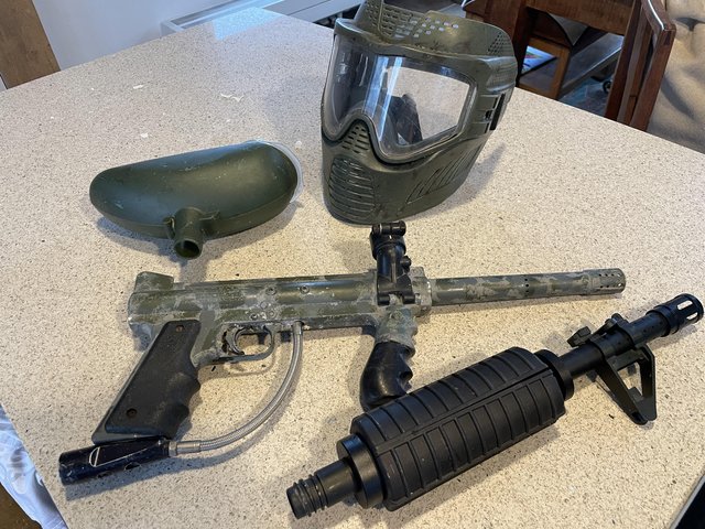 Preview of the first image of Tippman Paintball marker, mask, canister and silencer.