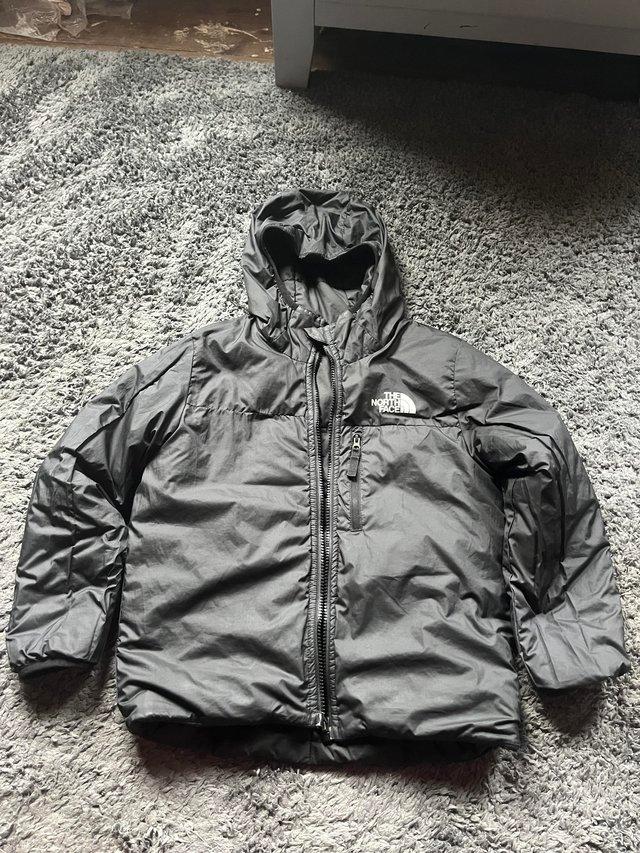 Preview of the first image of Boys 7-8 years North Face padded coat.
