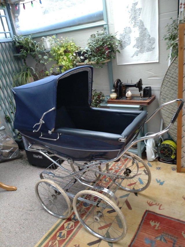 Preview of the first image of Vintage silver cross pram for sale.