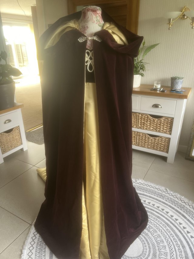 Preview of the first image of Celtic style wedding dress and cape.