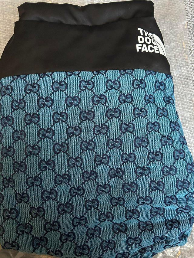 Preview of the first image of Brand new dog coat Dog Face X Pucci (Blue size Medium).