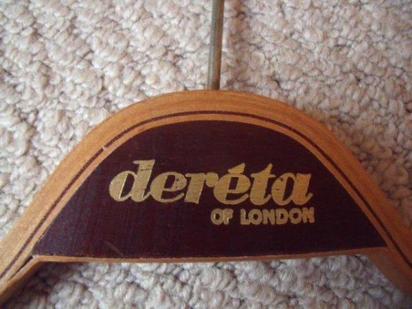 Image 3 of 2 vintage wood coat hangers Dereta of London. £8 both.
