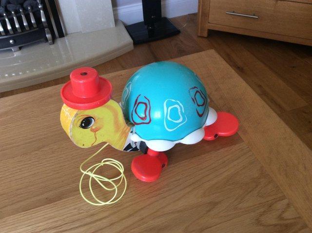 Preview of the first image of VINTAGE FISHER-PRICE 'TIP TOE TURTLE'.