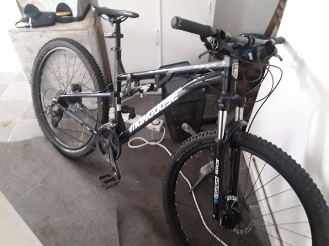 Preview of the first image of Mongoos full suspension 27 speed mens mountain bike.