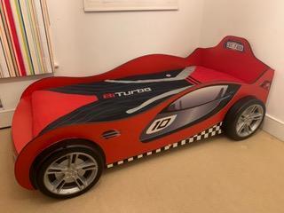 Preview of the first image of Kids Racing Car Bed, Bedspread and Bookcase.
