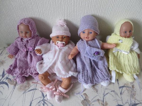 Image 2 of dolls all soft bodied in new clothes