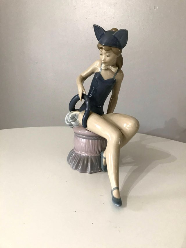 Preview of the first image of Lladro Rare Cat Girl Retired Figurine.