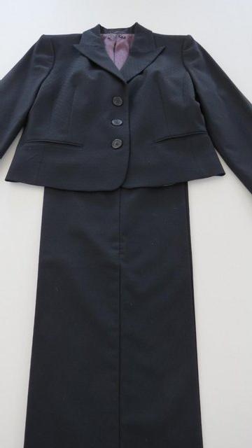 Preview of the first image of Ladies Trouser Suit  In Black Size 12.