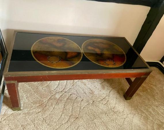 Image 1 of Coffee table with map on it