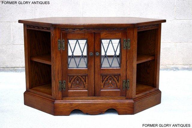 Image 1 of AN OLD CHARM LIGHT OAK CORNER TV DVD CD CABINET STAND TABLE