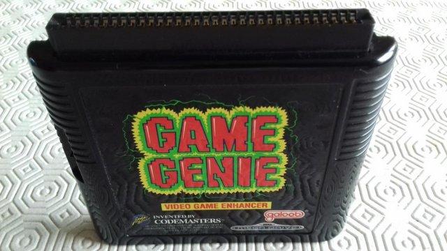Image 3 of SEGA Megadrive Game Genie cheat cartridge.