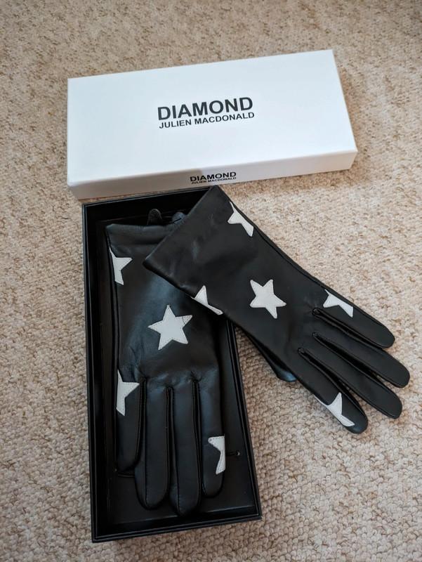 Preview of the first image of Black/white star leather gloves. New in box. Julien Macdonal.