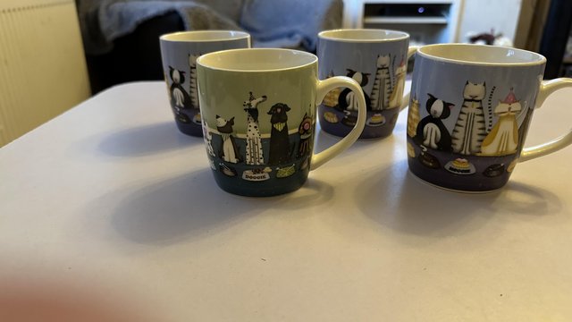 Preview of the first image of 4 x cat / dog cups ( used ).