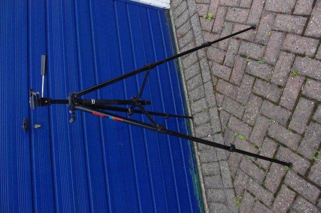 Image 1 of Camera tripod very sturdy and extends to five feet