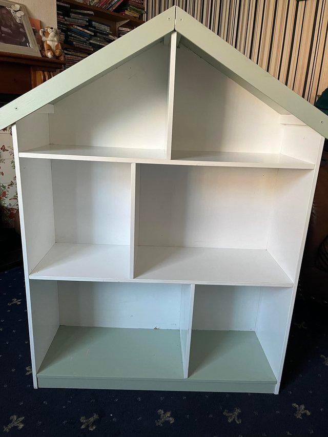 Preview of the first image of White and Green Solid Wooden Open Dolls House.