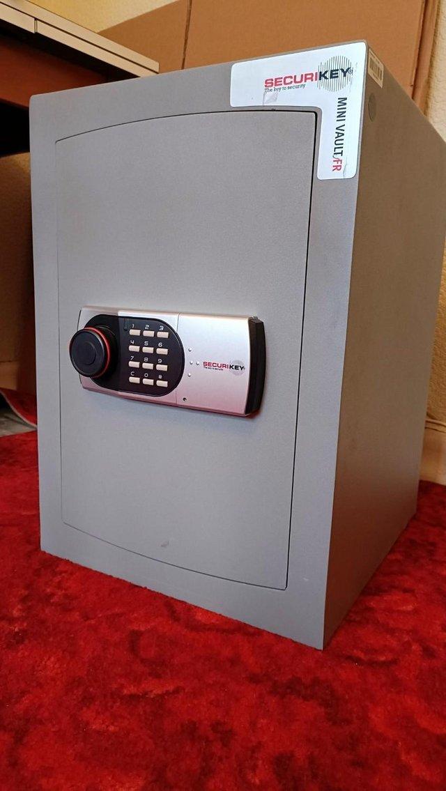 Preview of the first image of Securikey Mini Vault Gold (Size 2) Fire Resistant Safe.