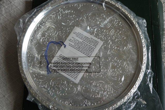 Preview of the first image of Two Ianthe Silver plated round tray / plates.