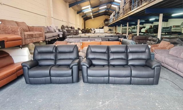 Preview of the first image of La-z-boy Staten black leather electric 3+2 seater sofas.