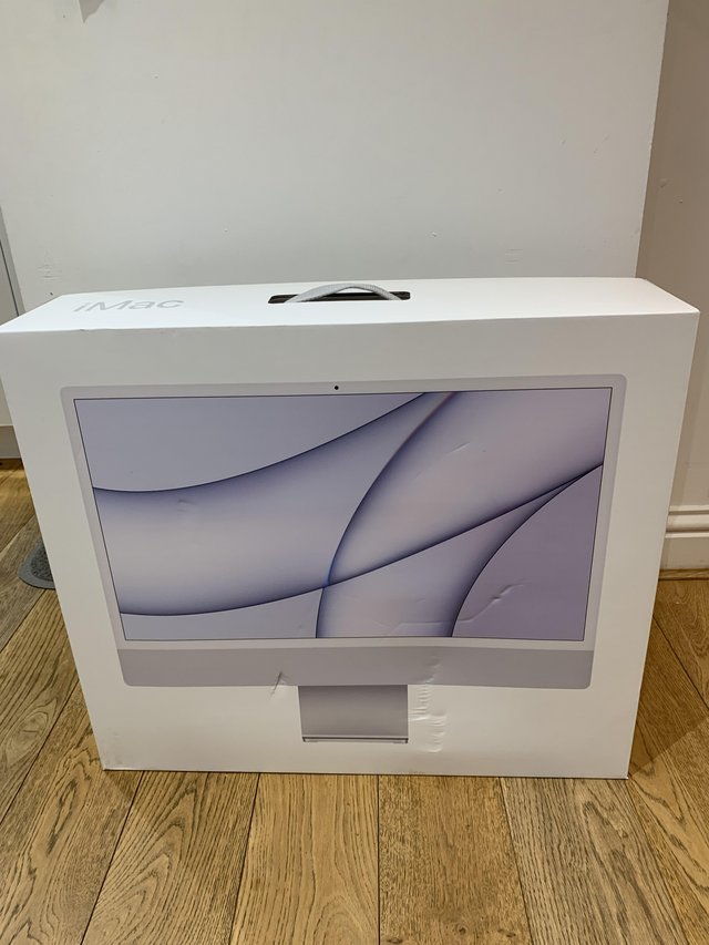 Preview of the first image of iMac 24” M1 21 complete in the original box.