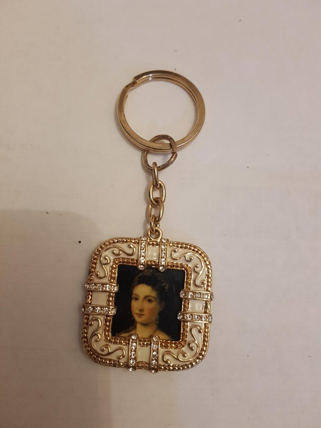 Preview of the first image of Rhinestone encrusted enamel and gold-plated keyring x 1.