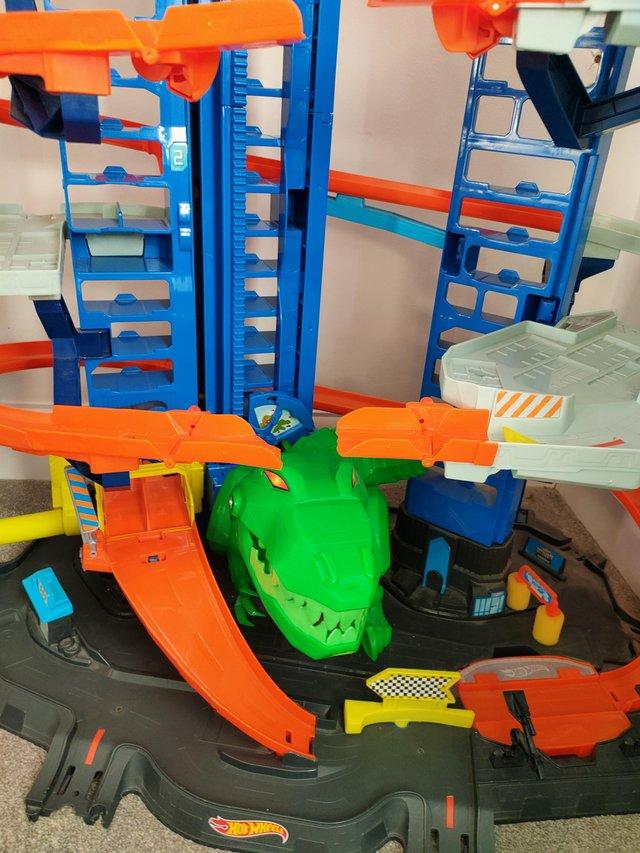 Preview of the first image of Hot wheels ultimate dinosaur garage.
