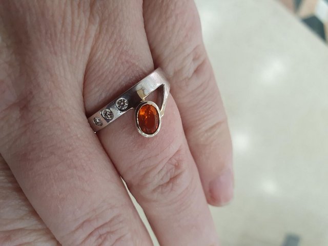 Preview of the first image of Fire opal and diamond white gold ring.