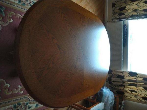 Image 1 of Stokers solid oak table beautiful condition