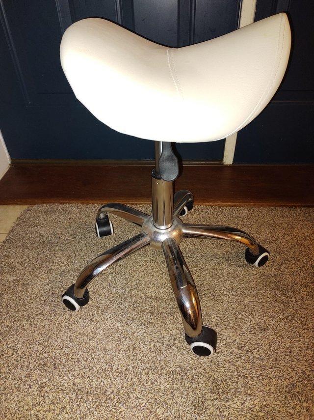 Preview of the first image of Height Adjustable Stool on wheels.