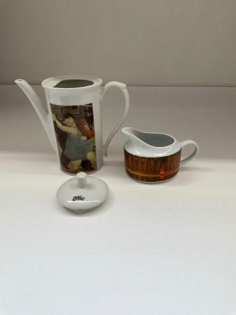 Image 1 of a coffee pot and a milk/cream pot after Botero