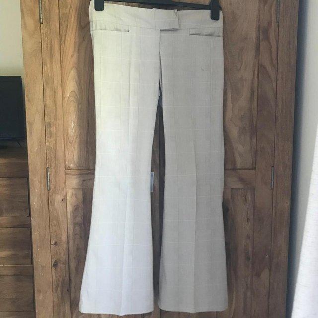 Preview of the first image of Vintage (1990's) Top Shop flared trousers. Size 10. Can post.