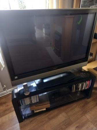 Image 1 of Flat screen tv and stand