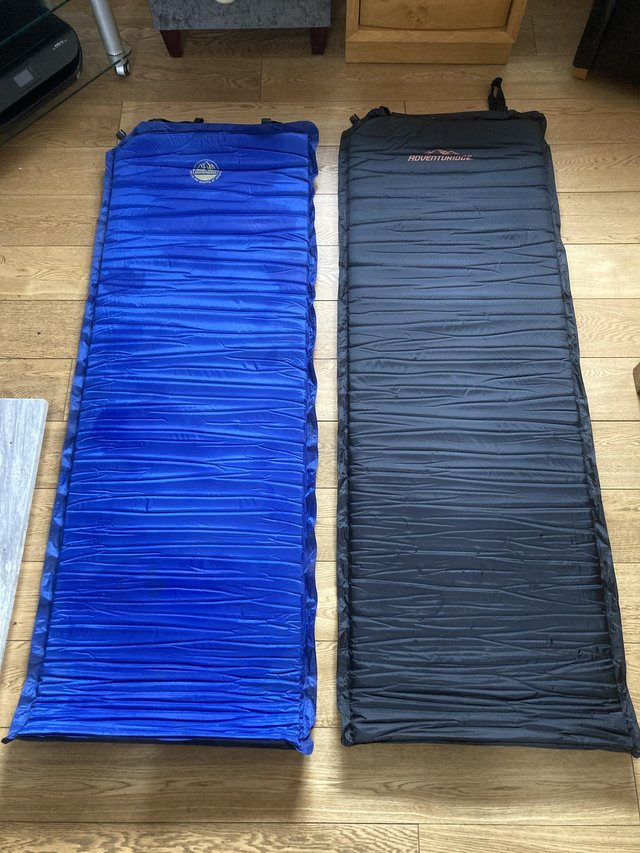 Preview of the first image of 4 Self inflating camping mats.