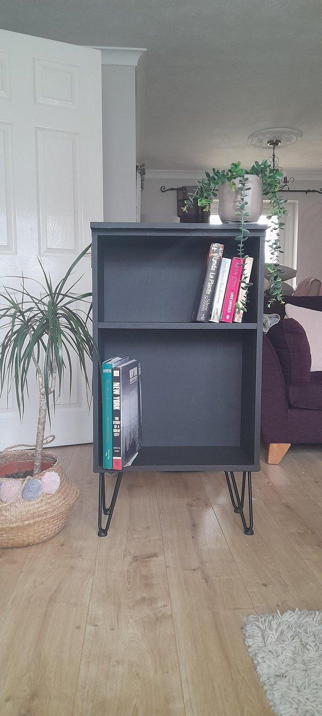 Preview of the first image of Upcycled black bookcase. As new.