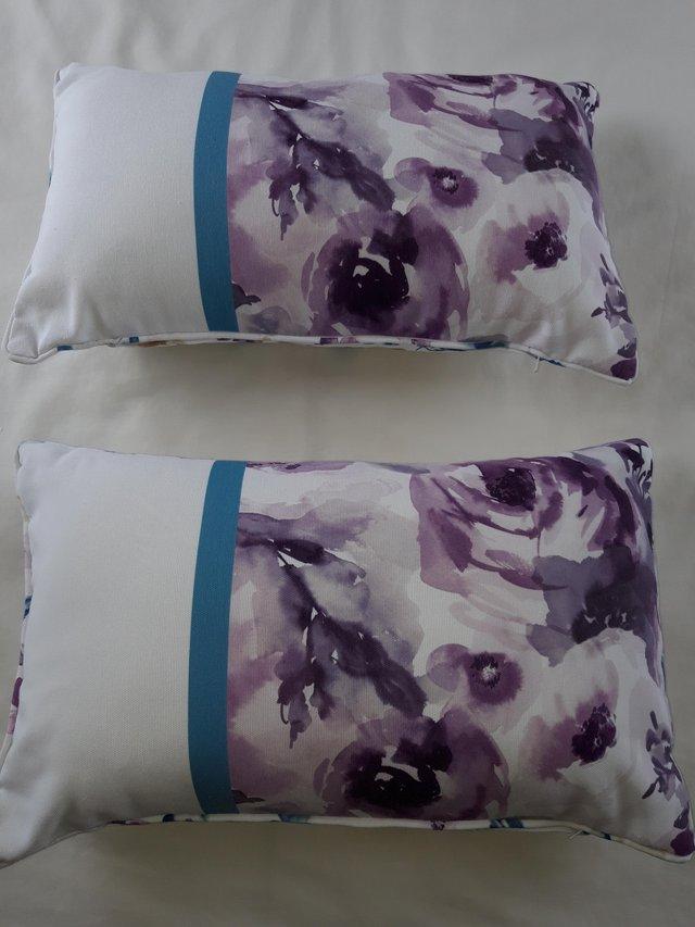 Preview of the first image of Two patterned cushions for sale.