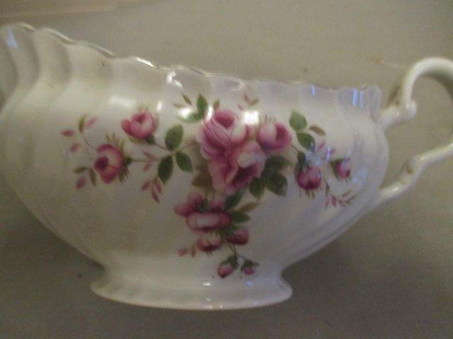 Preview of the first image of CHINA FLOWER DESIGN GRAVY BOAT.