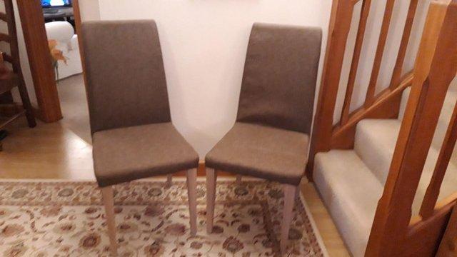 Preview of the first image of Dining Chairs one pair upholstered in light brown.