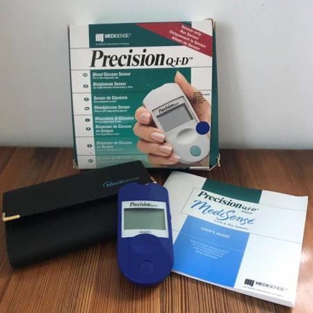 Image 1 of Blood glucose sensor / monitor, wallet & user's guide.Boxed