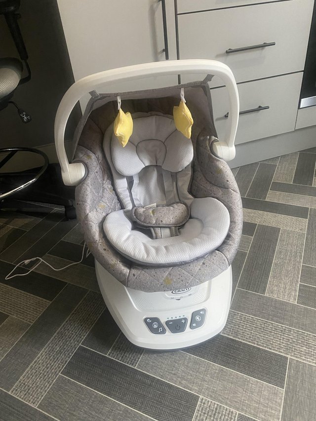 Preview of the first image of Graco baby swing like brand new.